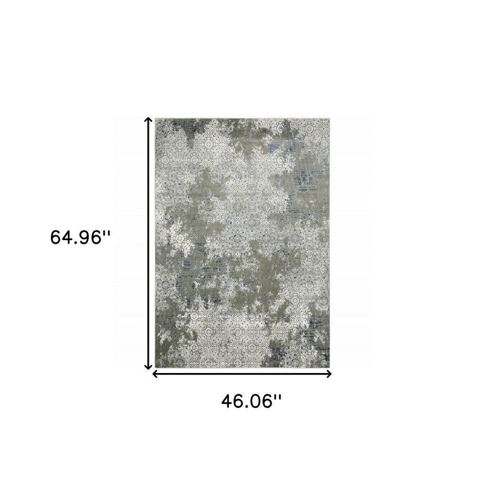 Beige and gray abstract distressed area rug, 4' x 6'.