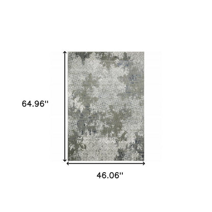 Beige and gray abstract distressed area rug, 4' x 6'.