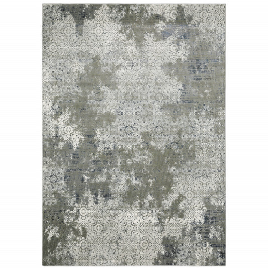 5' X 8' Ivory Grey Blue And Taupe Abstract Power Loom Stain Resistant Area Rug