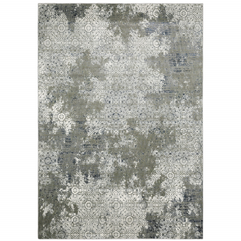 8' X 11' Ivory Grey Blue And Taupe Abstract Power Loom Stain Resistant Area Rug