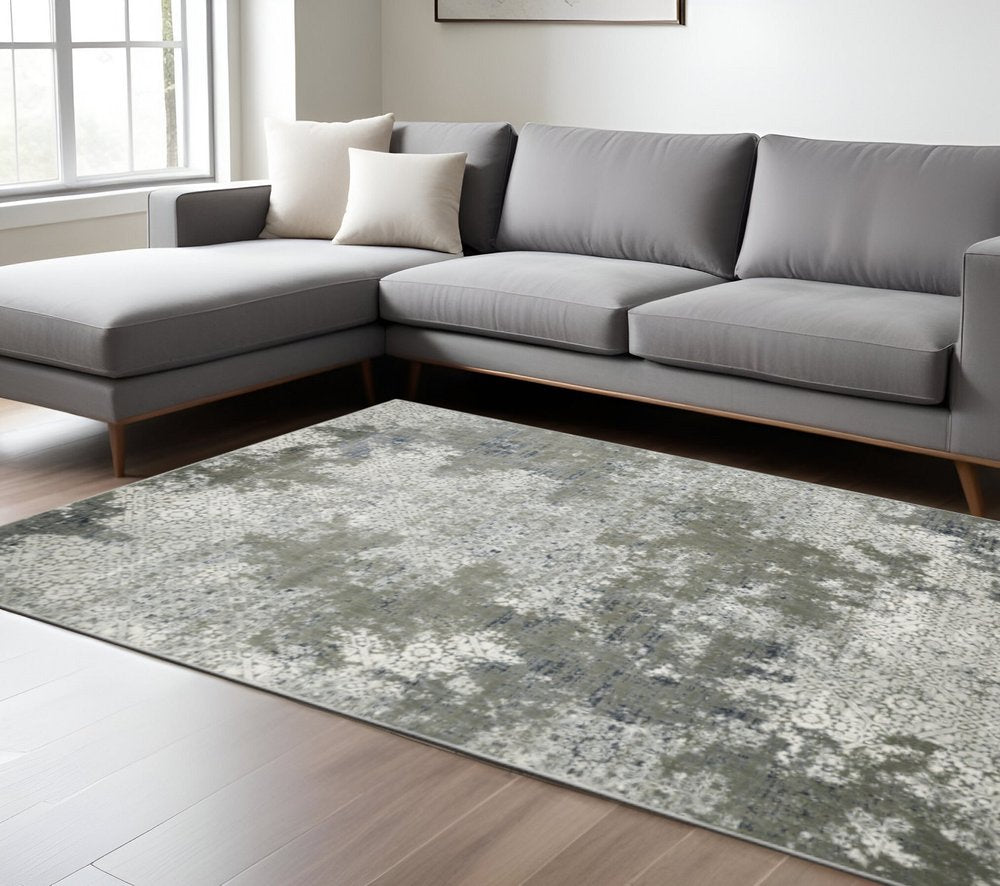 10' x 13' ivory, grey, blue & taupe abstract power loom stain-resistant area rug