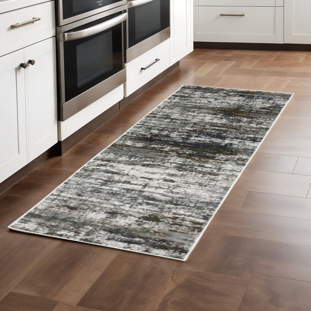 2' x 8' ivory, charcoal, grey, blue, rust and brown abstract power-loom stain-resistant runner rug.