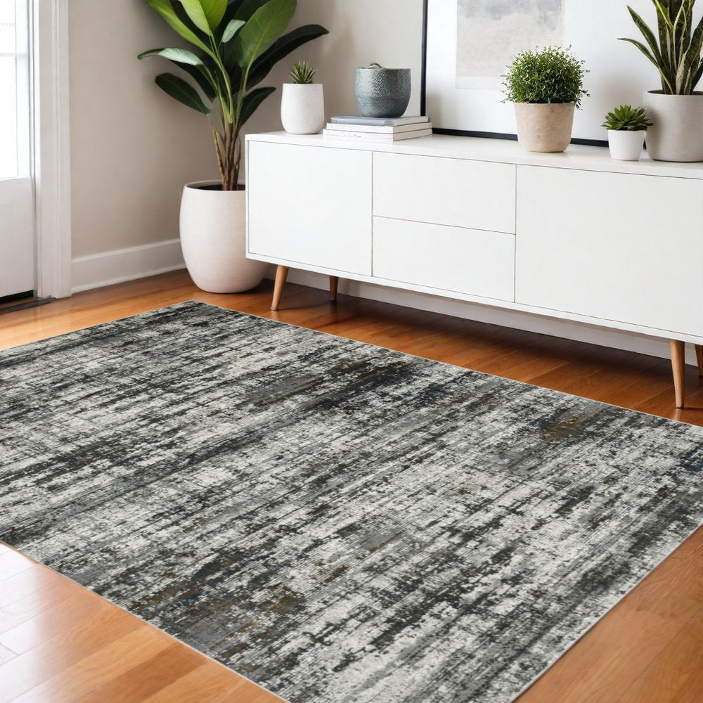 4' X 6' charcoal and gray abstract distressed area rug