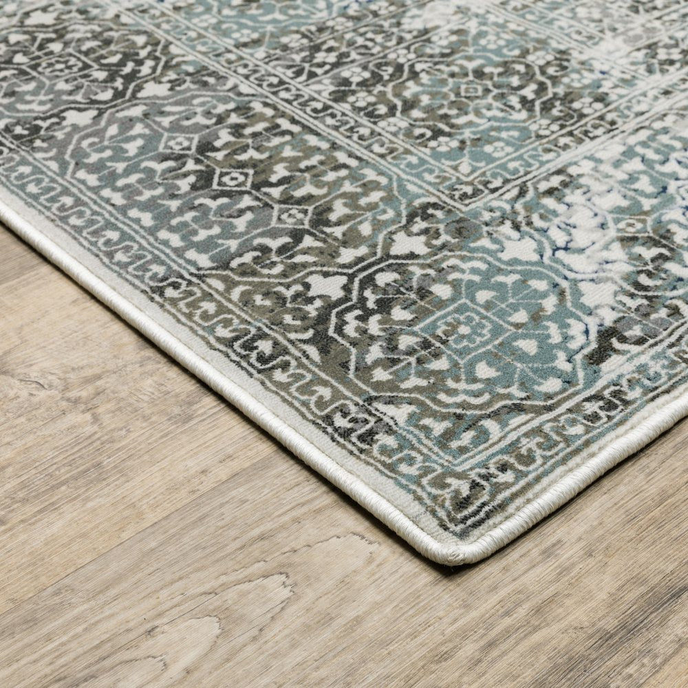 2' X 8' Ivory Grey Charcoal Blue And Rust Oriental Power Loom Stain Resistant Runner Rug