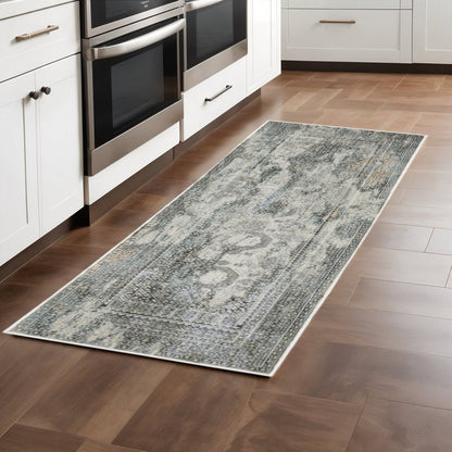 2' X 8' Ivory Grey Charcoal Blue And Rust Oriental Power Loom Stain Resistant Runner Rug
