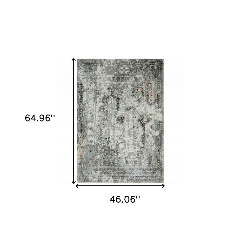 Gray and ivory oriental distressed area rug, 4' x 6'.