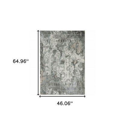 Gray and ivory oriental distressed area rug, 4' x 6'.