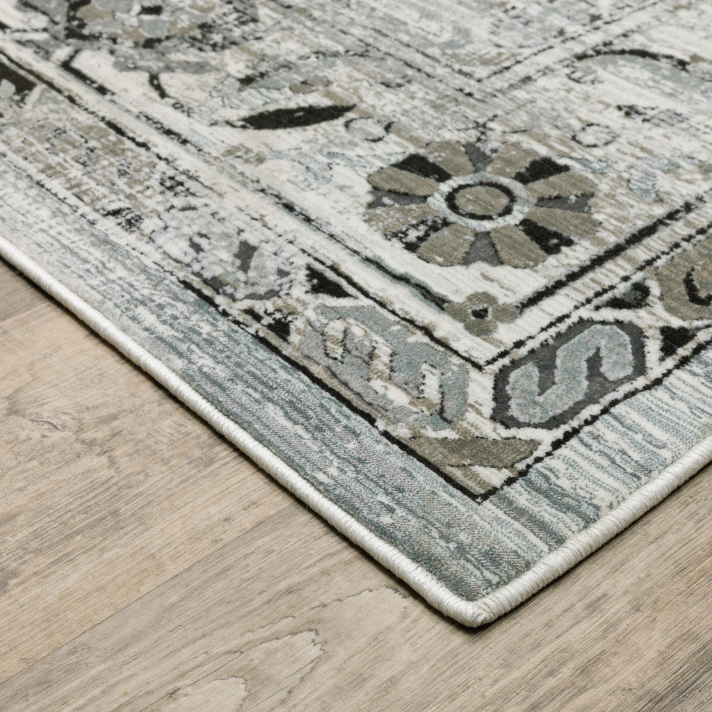 8' X 11' Ivory Grey Charcoal Blue And Taupe Oriental Power Loom Stain Resistant Area Rug