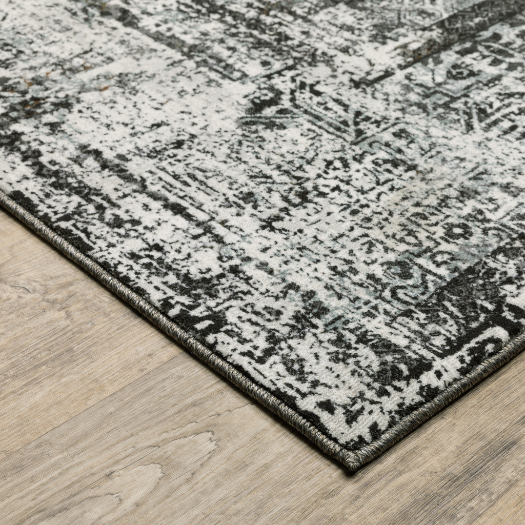 2' X 8' Charcoal Rust Grey Blue Ivory And Brown Oriental Power Loom Stain Resistant Runner Rug