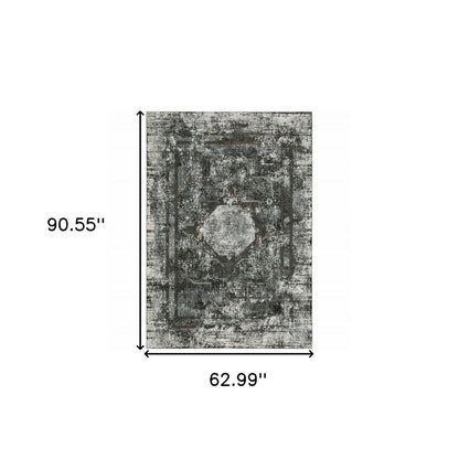 5' X 8' charcoal and gray oriental distressed area rug