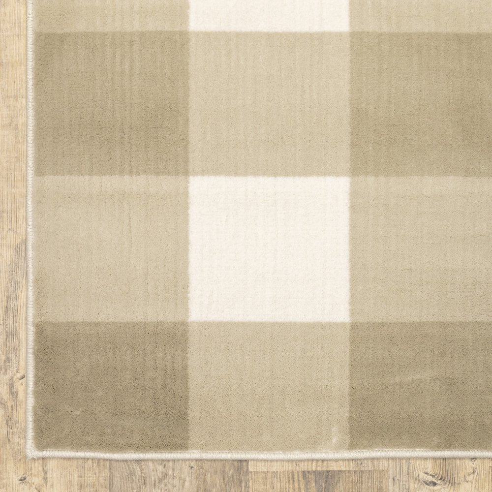 8' x 10' beige and ivory geometric power loom area rug, stain resistant.