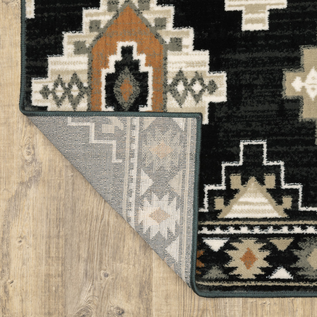 2' X 8' Black Grey Tan Orange And Ivory Southwestern Power Loom Stain Resistant Runner Rug