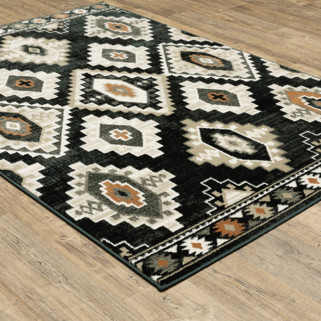 4' X 6' Black Grey Tan Orange And Ivory Southwestern Power Loom Stain Resistant Area Rug