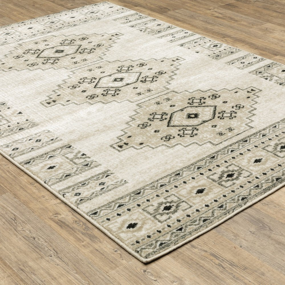 7' X 9' Gray And Ivory Southwestern Area Rug