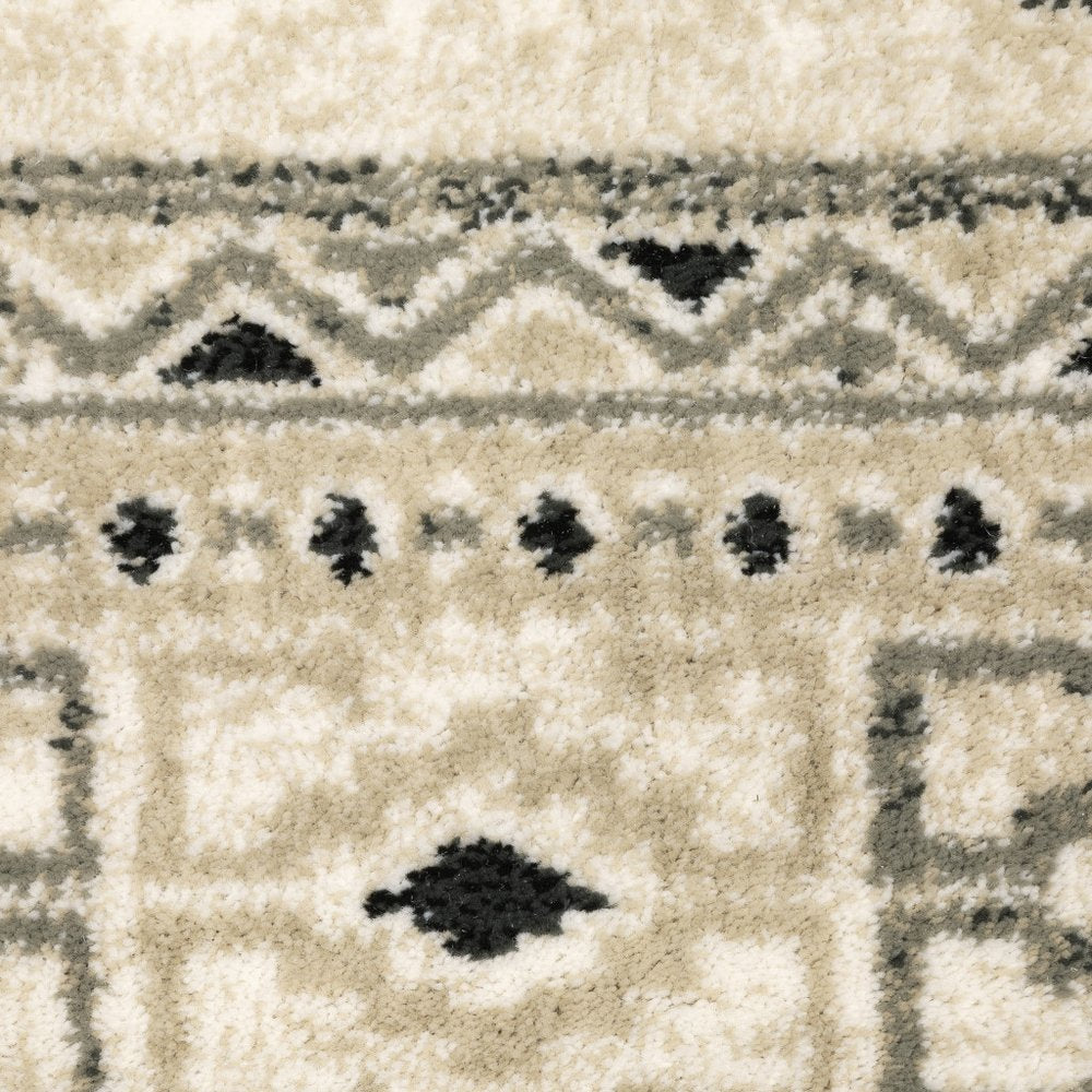 7' X 9' Gray And Ivory Southwestern Area Rug