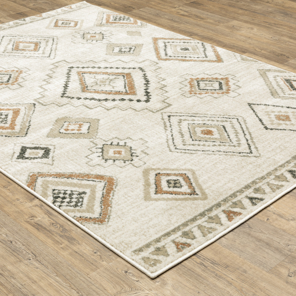 4' X 6' Ivory Orange Tan Black And Grey Southwestern Power Loom Stain Resistant Area Rug