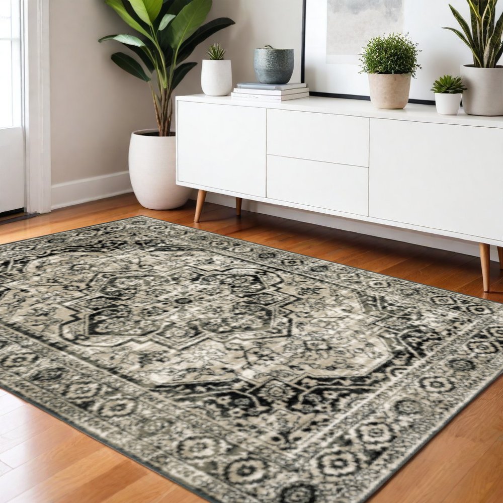 4' X 6' Black Grey Tan And Ivory Oriental Power Loom Stain Resistant Area Rug