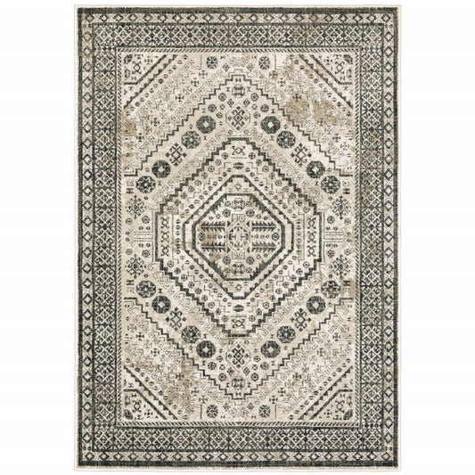 5' X 7' Ivory Grey Black And Ivory Oriental Power Loom Stain Resistant Area Rug