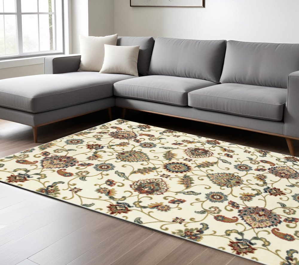 8' X 11' Ivory Green Blue Red Salmon And Yellow Floral Power Loom Stain Resistant Area Rug