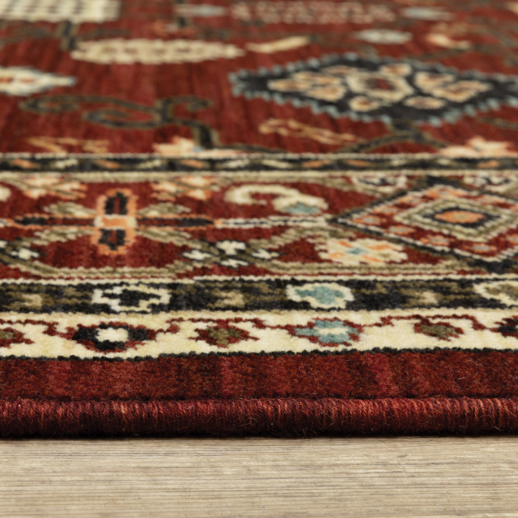 2' X 3' Red Black Ivory And Brown Oriental Power Loom Stain Resistant Area Rug With Fringe