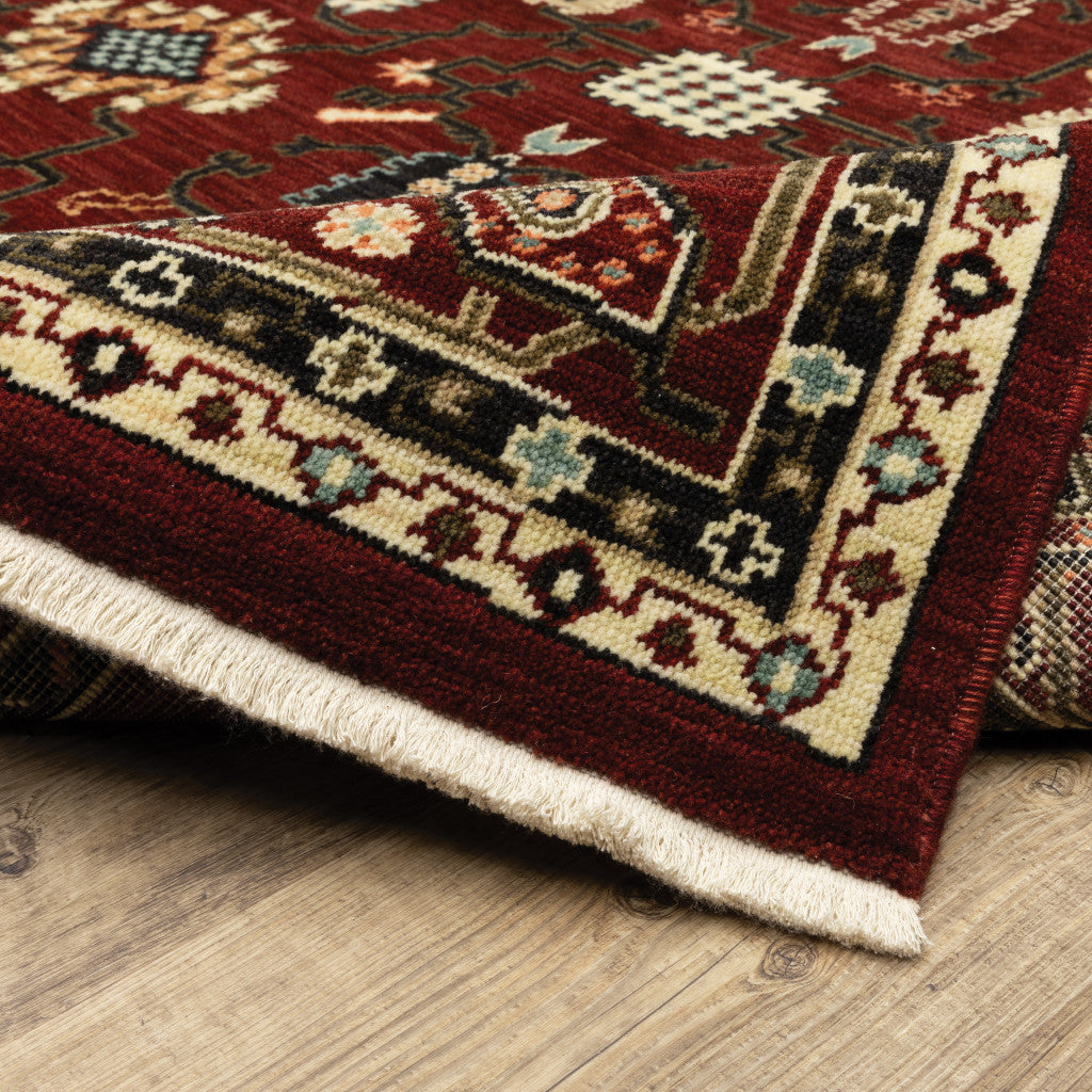 2' X 3' Red Black Ivory And Brown Oriental Power Loom Stain Resistant Area Rug With Fringe