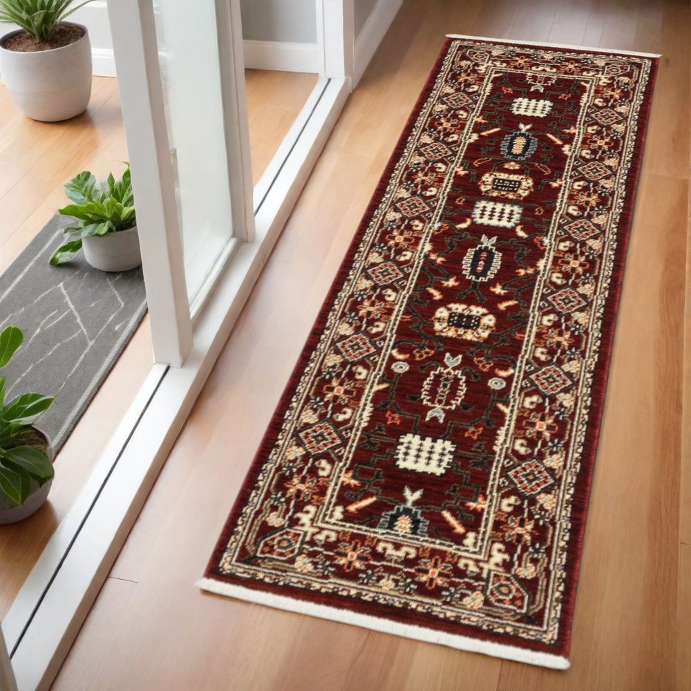2' X 6' Red Black Ivory And Brown Oriental Power Loom Stain Resistant Runner Rug With Fringe