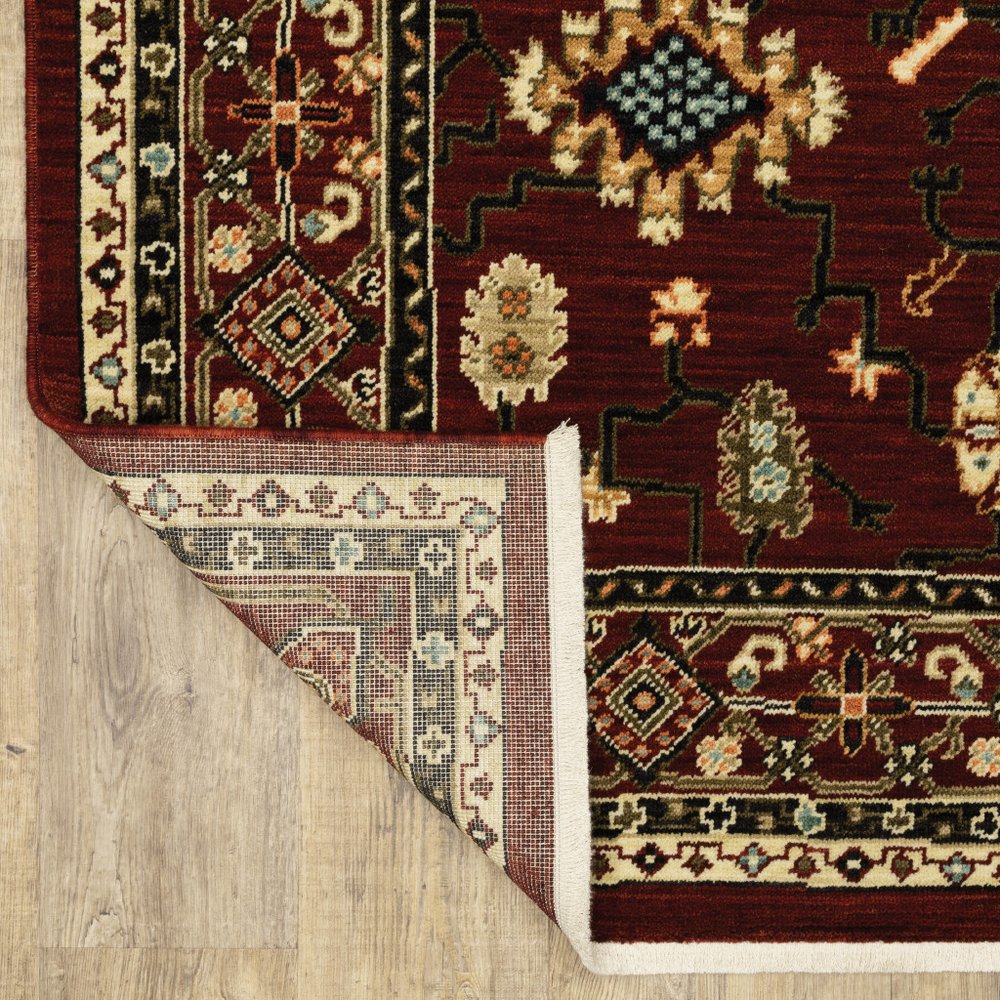 2' X 6' Red Black Ivory And Brown Oriental Power Loom Stain Resistant Runner Rug With Fringe