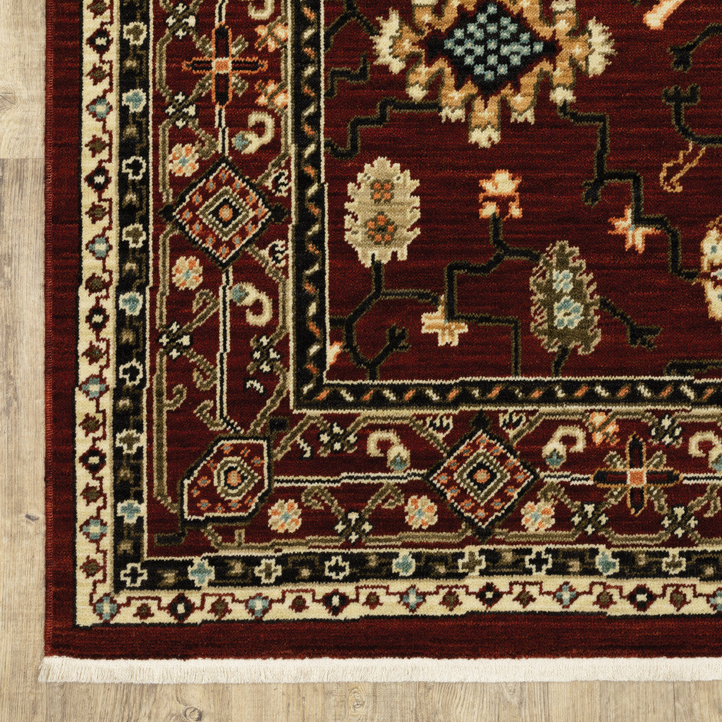 2' X 6' Red Black Ivory And Brown Oriental Power Loom Stain Resistant Runner Rug With Fringe