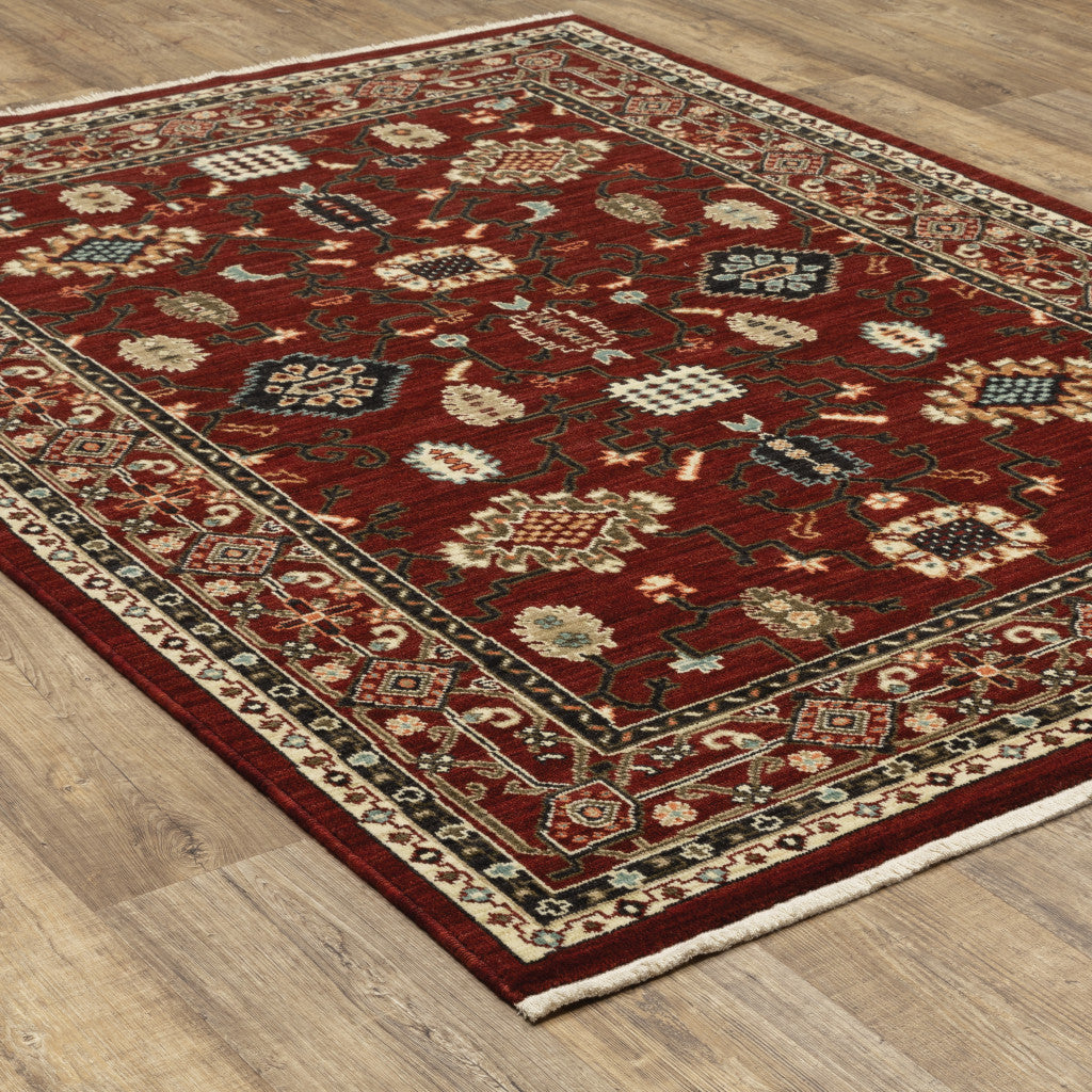 3' X 5' Red Black Ivory And Brown Oriental Power Loom Stain Resistant Area Rug With Fringe