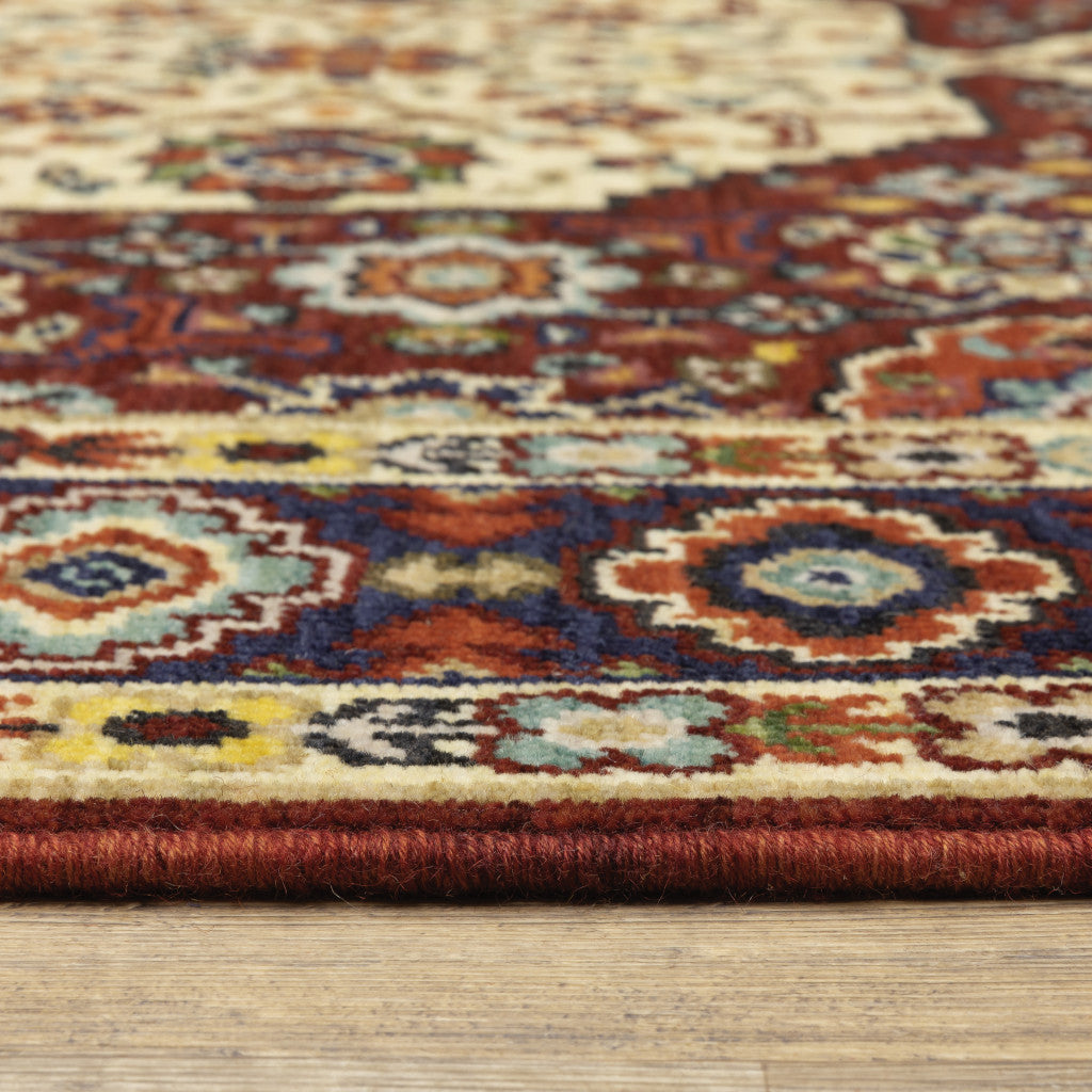 2' X 3' Red Ivory Blue And Orange Oriental Power Loom Stain Resistant Area Rug With Fringe