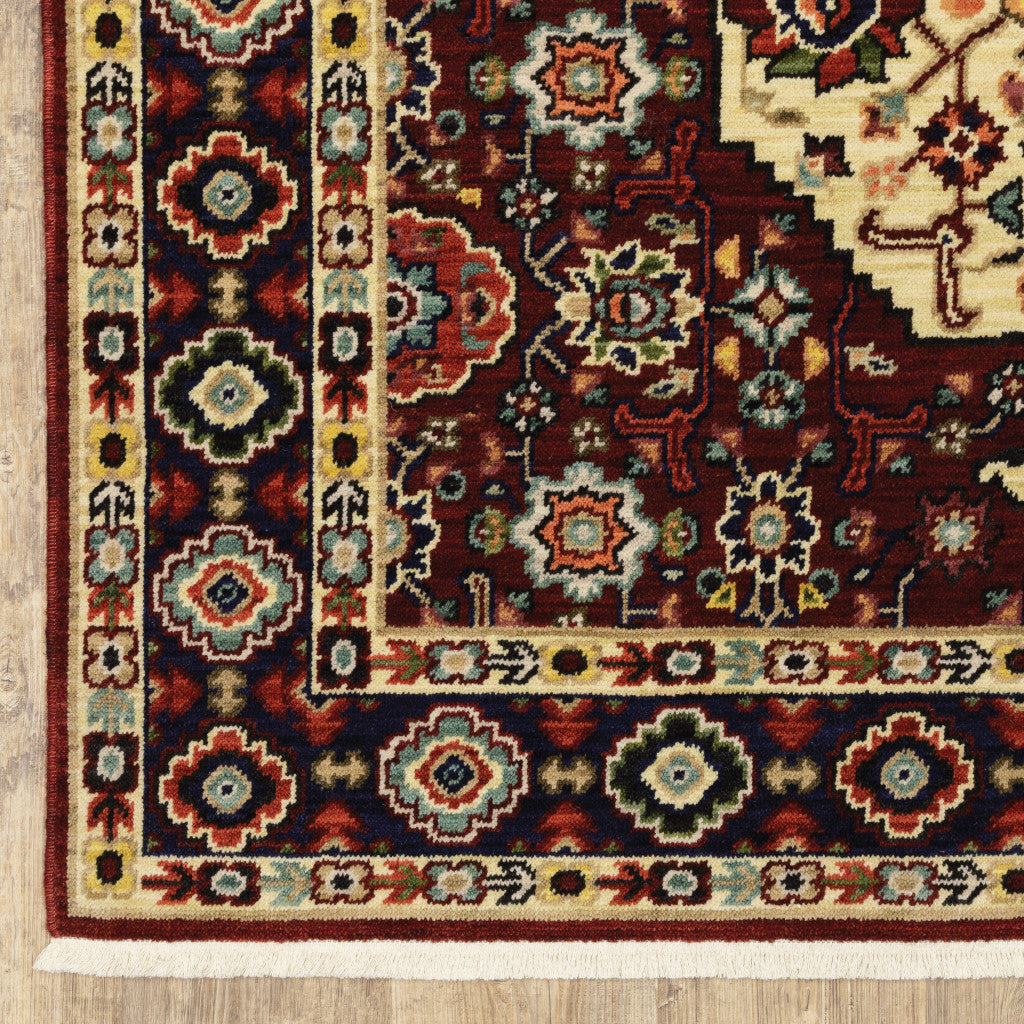 2' X 3' Red Ivory Blue And Orange Oriental Power Loom Stain Resistant Area Rug With Fringe