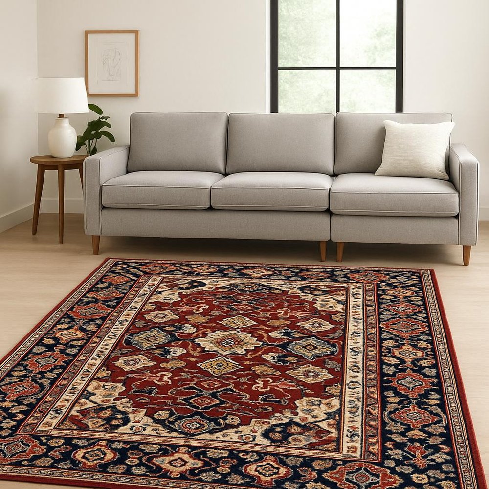 10' X 13' Red Blue Orange And Beige Oriental Power Loom Stain Resistant Area Rug With Fringe