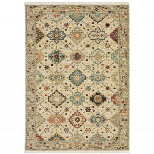 3' x 5' beige pale blue rust gold tan brown and orange oriental power loom stain resistant area rug with fringe.