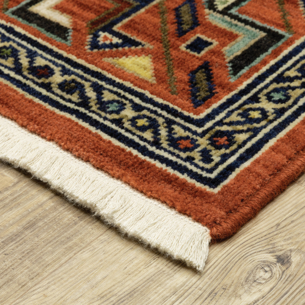 5' X 8' Red Blue Beige And Green Oriental Power Loom Stain Resistant Area Rug With Fringe