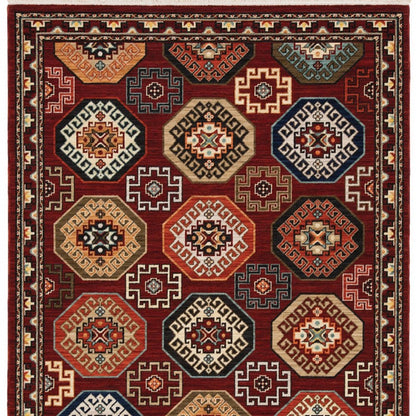 5' X 8' Red Blue And Black Oriental Area Rug With Fringe