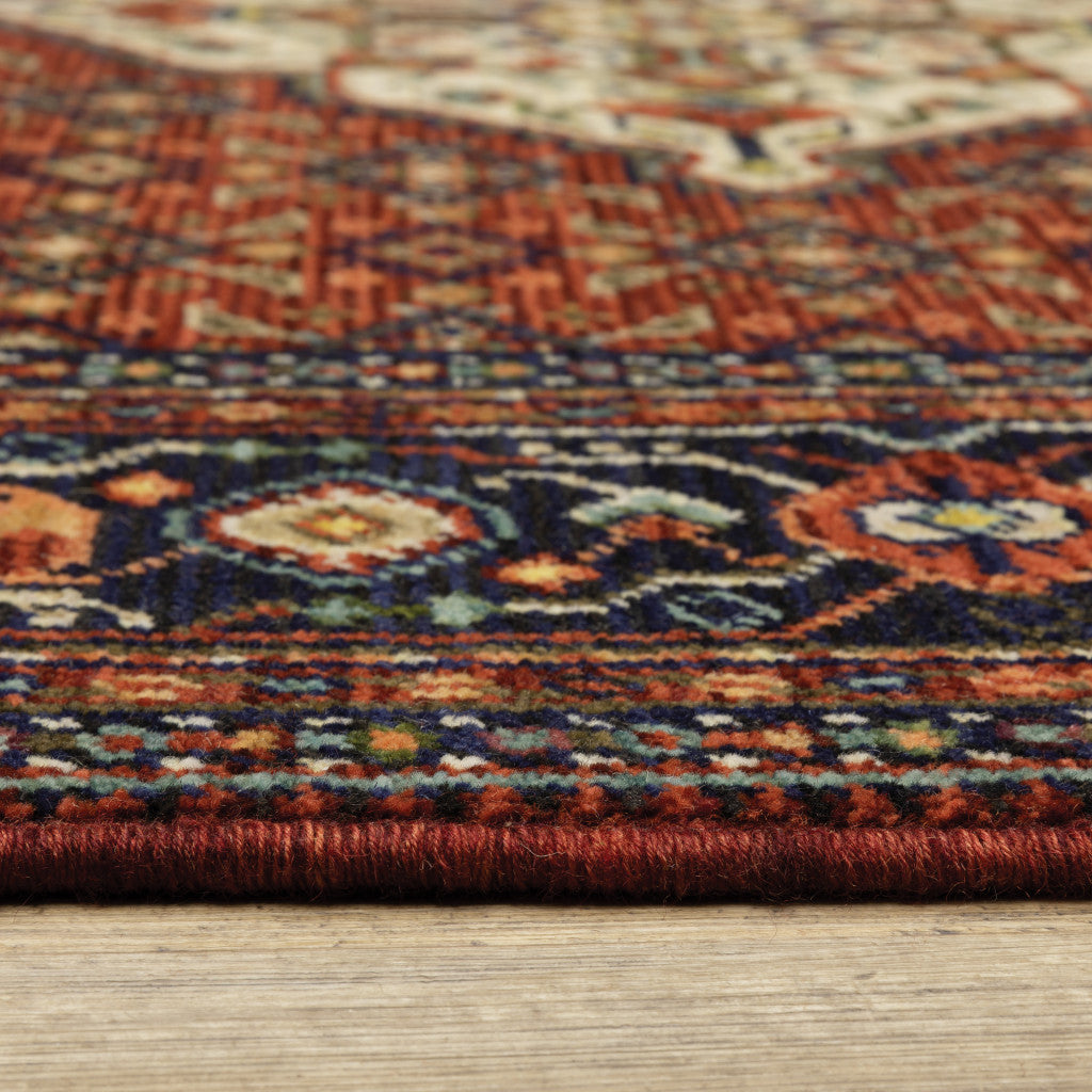 2' X 3' Red Blue Ivory And Orange Oriental Power Loom Stain Resistant Area Rug With Fringe