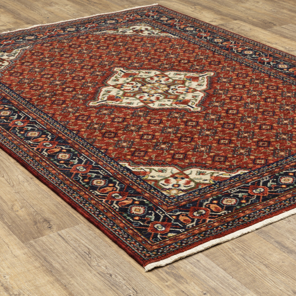 2' X 3' Red Blue Ivory And Orange Oriental Power Loom Stain Resistant Area Rug With Fringe