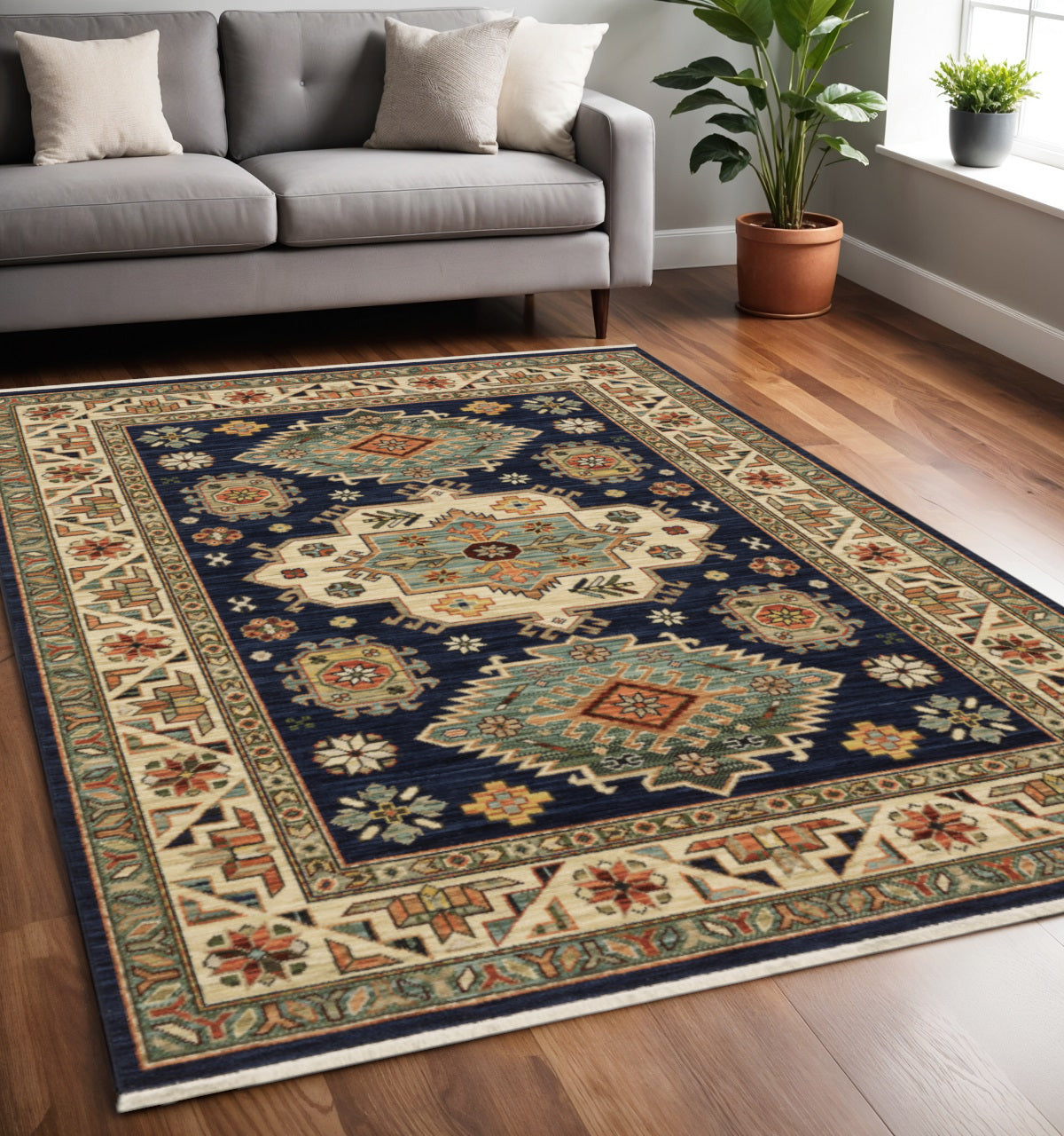 5' X 8' Blue and Beige Oriental Power Loom Area Rug With Fringe