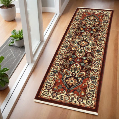 2' X 6' Red Ivory Orange And Blue Oriental Power Loom Stain Resistant Runner Rug With Fringe