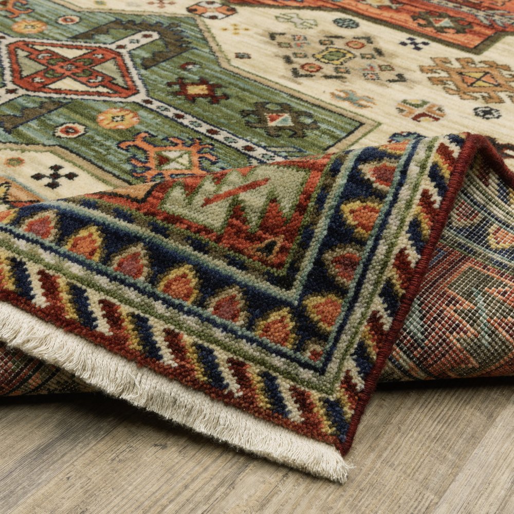6' X 9' Brick Red Orange Rust Beige Gold Pale Blue Olive Navy And Black Oriental Power Loom Stain Resistant Area Rug With Fringe