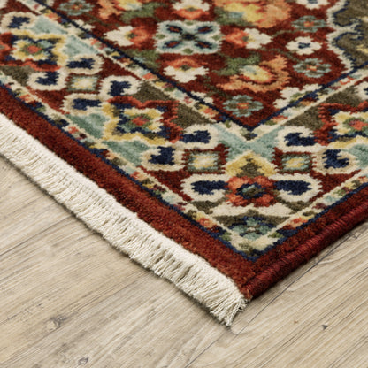 2' X 3' Red Rust Navy Light Blue Brown Orange Ivory And Gold Oriental Power Loom Stain Resistant Area Rug With Fringe