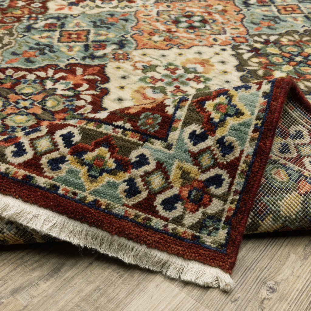 2' X 3' Red Rust Navy Light Blue Brown Orange Ivory And Gold Oriental Power Loom Stain Resistant Area Rug With Fringe