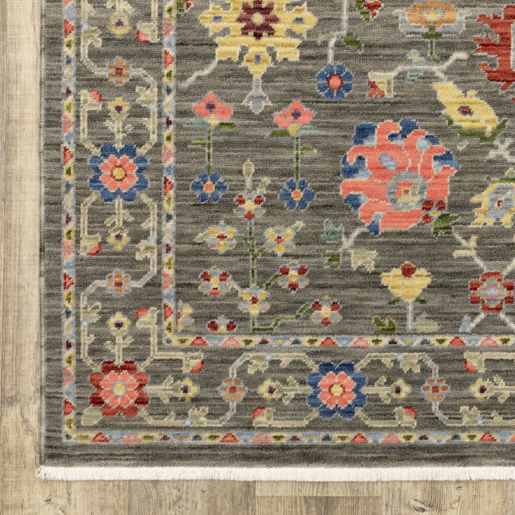 3' X 5' Grey Salmon Pink Gold Blue Rust Deep Blue Ivory And Green Oriental Power Loom Stain Resistant Area Rug With Fringe