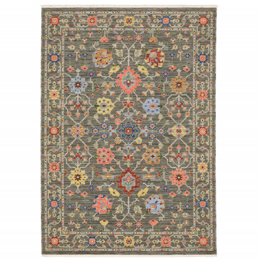 5' X 8' Grey Salmon Pink Gold Blue Rust Deep Blue Ivory And Green Oriental Power Loom Stain Resistant Area Rug With Fringe