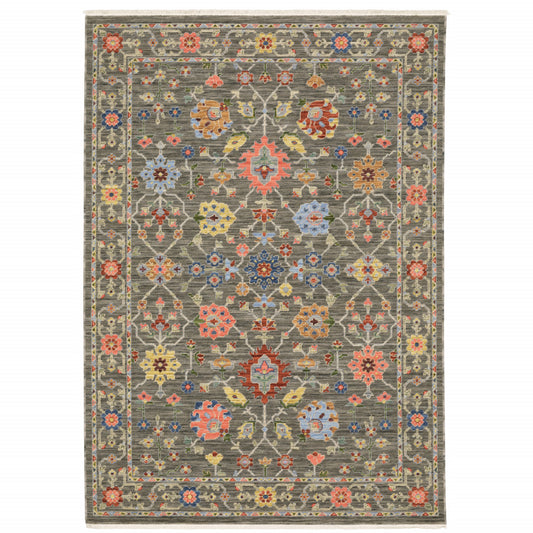 6' X 9' Grey Salmon Pink Gold Blue Rust Deep Blue Ivory And Green Oriental Power Loom Stain Resistant Area Rug With Fringe