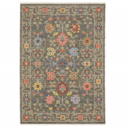 8' X 11' Grey Salmon Pink Gold Blue Rust Deep Blue Ivory And Green Oriental Power Loom Stain Resistant Area Rug With Fringe