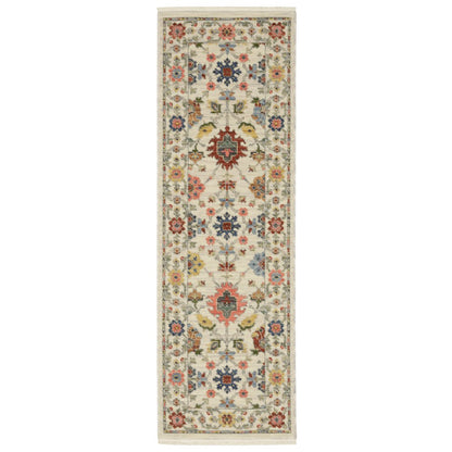 2' X 6' Ivory Salmon Pink Gold Blues Grey Rust And Green Oriental Power Loom Stain Resistant Runner Rug With Fringe