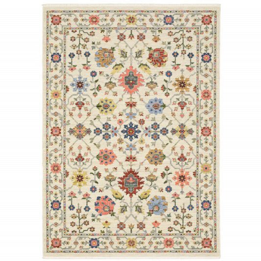 5' X 8' Ivory Salmon Pink Gold Blues Grey Rust And Green Oriental Power Loom Stain Resistant Area Rug With Fringe