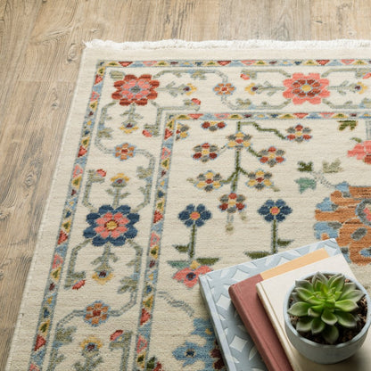 5' X 8' Ivory Blue And Red Oriental Area Rug With Fringe
