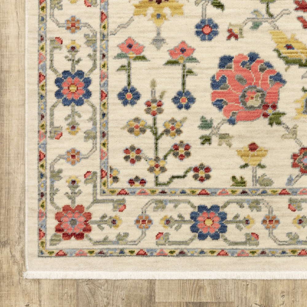 5' X 8' Ivory Blue And Red Oriental Area Rug With Fringe
